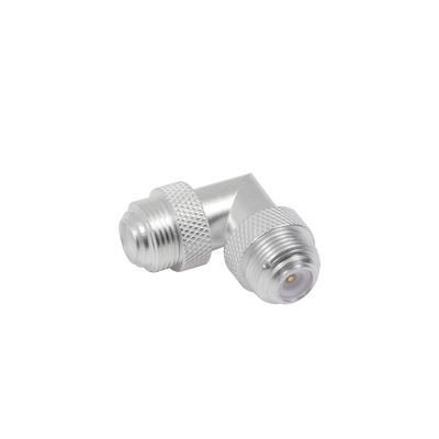 Adaptador Universal Macho UNIDAPT a Macho en Angulo Recto. Plata-Oro-Teflón.